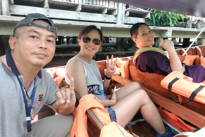 Amphawa and Railway Markets with Boat Ride Group Tour - Amphawa after dark, food, timber buildings, and the canal