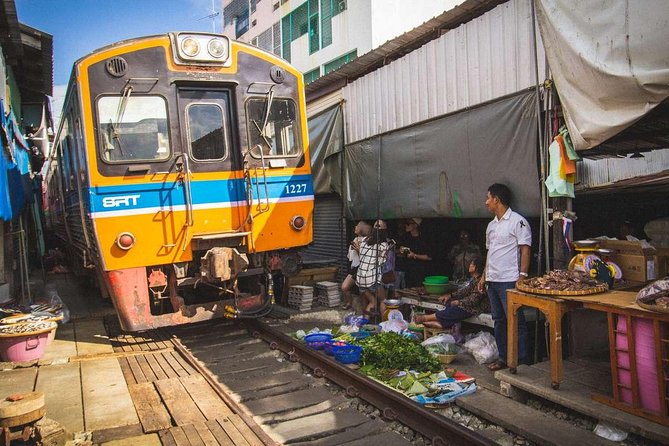 Amphawa Floating Market Tour with Maeklong Railway Market (SHA Plus) - Language, timing, and health details