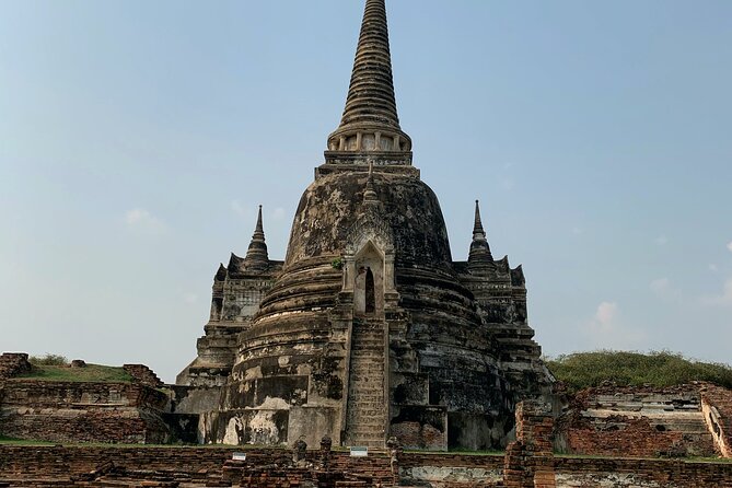 Ayutthaya Sunset Boat Ride & Famous Attraction From Bangkok - Wat Yai Chai Mongkhon and its tall stupa