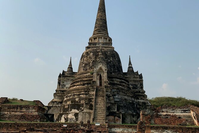 Ayutthaya Sunset Join Tour, Boat Ride, Famous Spot & Local Market - Wat Yai Chai Mongkhon and its tall prang