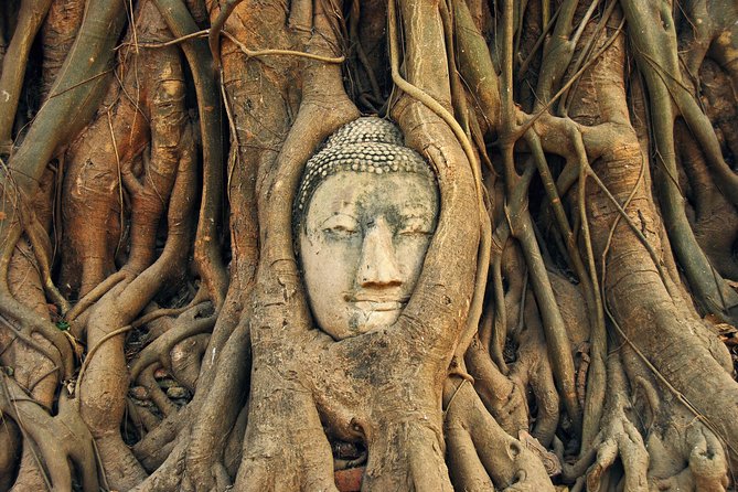 Ayutthaya Sunset Tour: Iconic Temples & Scenic River Boat Ride - Wat Mahathat and Ayutthaya’s famous Buddha head