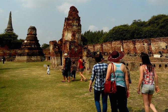 Ayutthaya UNESCO Temples Group Tour with Lunch - Wat Mahathat and the Buddha in the tree roots