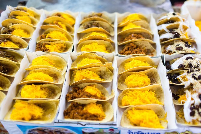 Bangkok by Night: Temples, Markets and Food Tuk-Tuk Tour - Dinner at a changing local restaurant