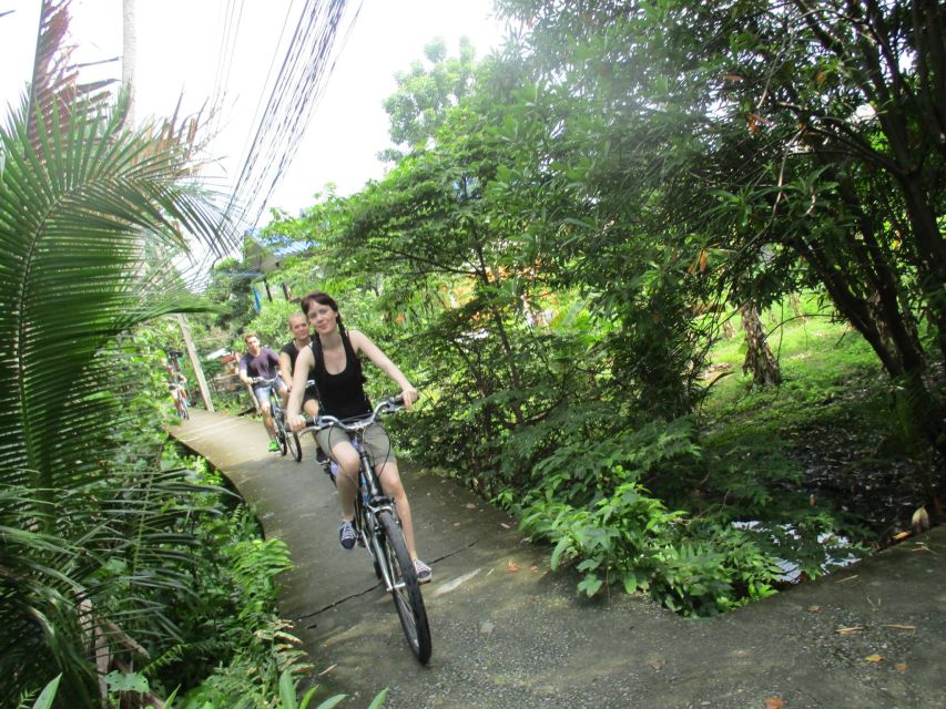 Bangkok Full-Day Bike Tour with Boat Transfer and Lunch - Communities beneath the highway