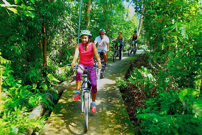 Bangkok Green Oasis 4-Hour Bike Tour with Boat Ride - Riding through Bangkachao’s back paths
