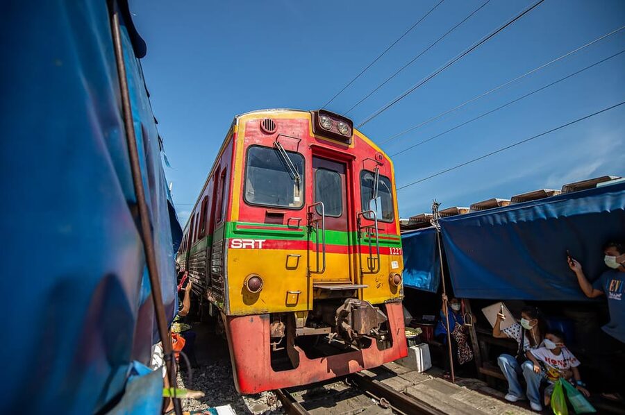 Bangkok: Maeklong Railway Market and Amphawa Floating Market - The banyan-tree temple adds a quiet change of pace