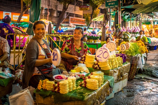 Bangkok: Night Bike Tour with Temples & Flower Market Visit - The Rama VIII Bridge and the Chao Phraya ferry