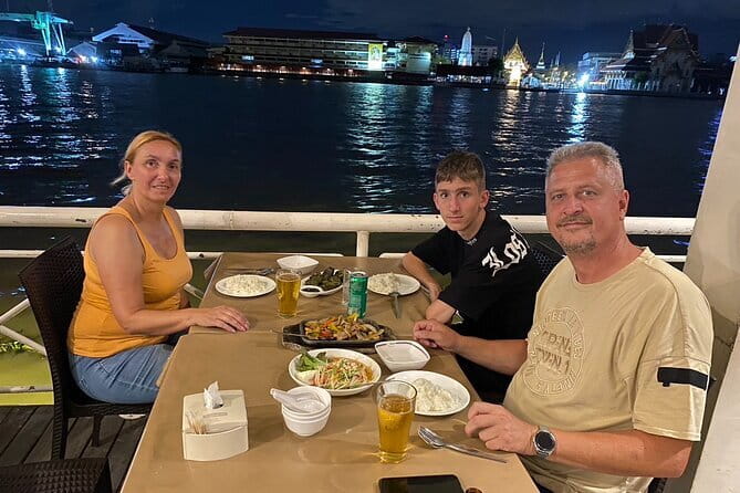 Bangkok Night Food Tour By Tuk Tuk - Wat Prayurawongsawat under the evening lights
