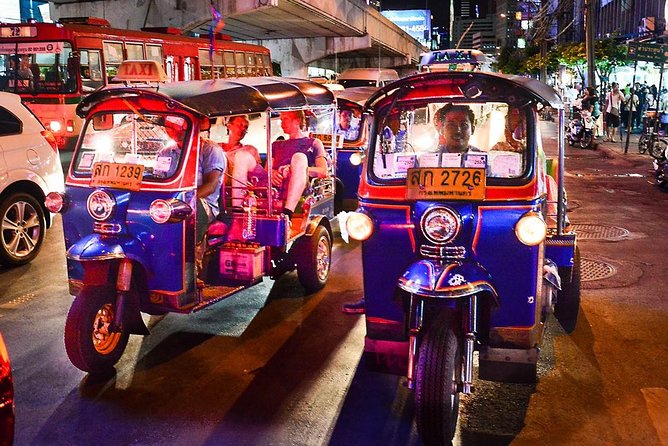Bangkok Night Lights: Temple & City Tour by Tuk Tuk (SHA Plus) - Tha Chang, a snack, and the royal district