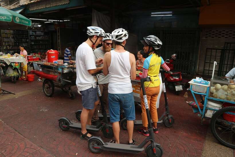 Bangkok: Riverside E-Scooter Adventure with StreetFood Snack - Tha Din Daeng Market and the everyday side of Bangkok