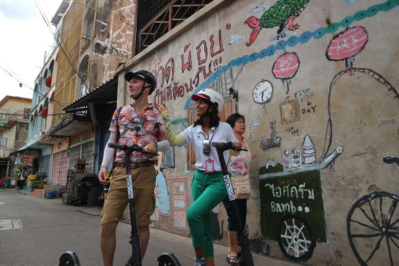 Bangkok: Riverside E-Scooter Adventure with StreetFood Snack - Kudeejeen, Santa Cruz, and Portuguese influence