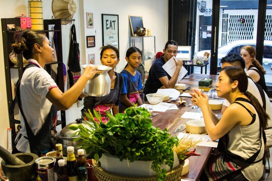 Bangkok: Thai Cooking Class and Onnuch Market Tour - Cooking Pad Thai, curry, and papaya salad