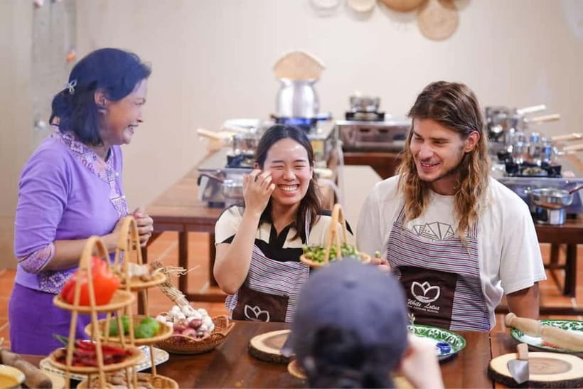 Bangkok: White Lotus Thai Cooking Class with Market Tour - Spice levels, vegetarian dishes, and family appeal