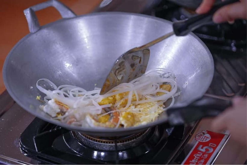 Bangkok: White Lotus Thai Cooking Class with Market Tour - The cozy setting above Paak Klong Talad