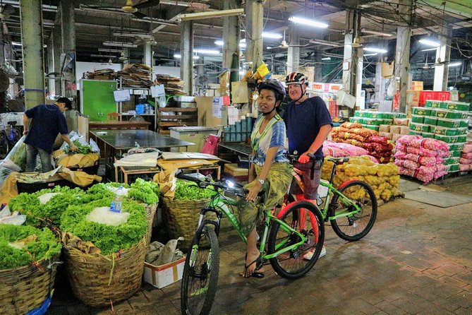 Bike Bangkok at Night with Thai Dinner - A Chinese Buddhist temple and Chinatown lights