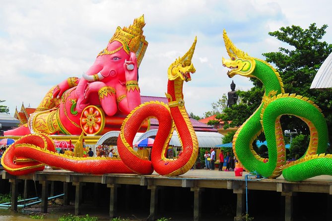 Chachoengsao One Day Trip from Bangkok : Historic Market and Buddhist Temples - Wat Sothon’s white marble and gold details