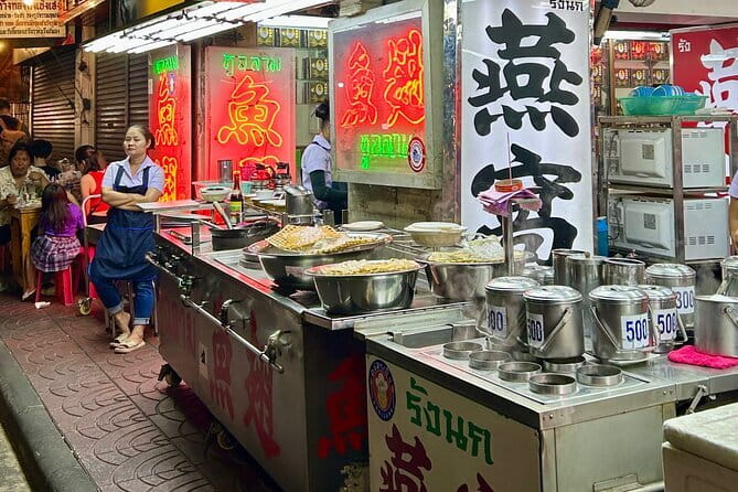 Chinatown Street Food Small Group Tour in Bangkok - Walking into Yaowarat after dark