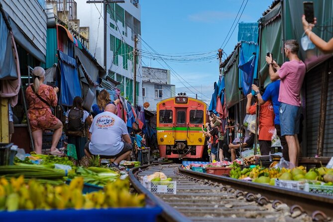 Damnoen Saduak Floating Market and Maeklong Railway Market Tour - Two markets, one long day from Bangkok