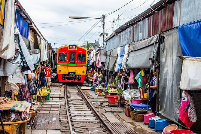 Damnoen Saduak Floating Market and Maeklong Railway Market Tour - Wat Bang Kung, the banyan-root chapel