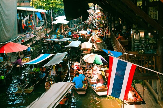 Damnoen Saduak Floating Market & Maeklong Railway Market Tour From Bangkok - Seeing the Train Pass Through Maeklong Market