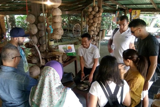 Damnoen Saduak Floating Market Small Group Tour - Fruit, stilt homes, and the coconut stop
