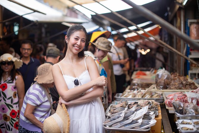 DamnoenSaduak Floating Market Michelin Food One Day Tour - Maeklong Railway Market and the train through the stalls