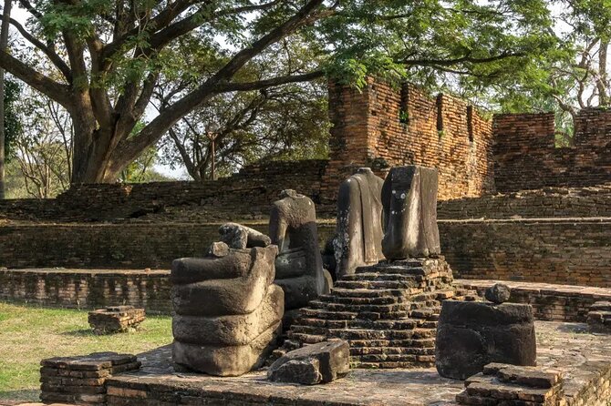 Day Tour of Ayutthaya and Bang Pa-In - Wat Mahathat and the Buddha held by tree roots