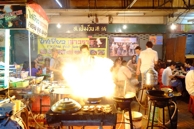 Discover Bangkok at Night 5-Hour Bike Tour with dinner - Rolling onto the Chao Phraya ferry
