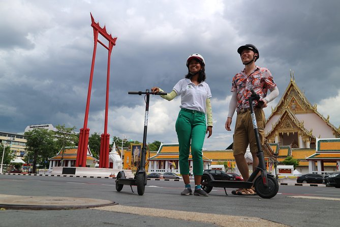 Explore Bangkok by E-Scooter & Try Street Food - Tha Din Daeng Market and pork satay