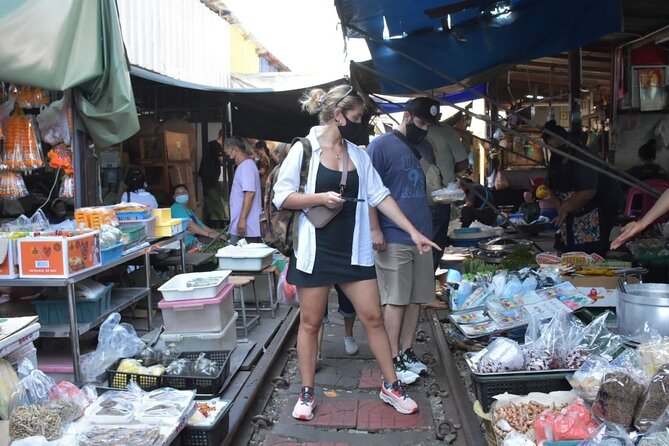Floating Market with Great Pagoda Temple and Wat Sam Phran - Maeklong Railway Market and the Train Trick