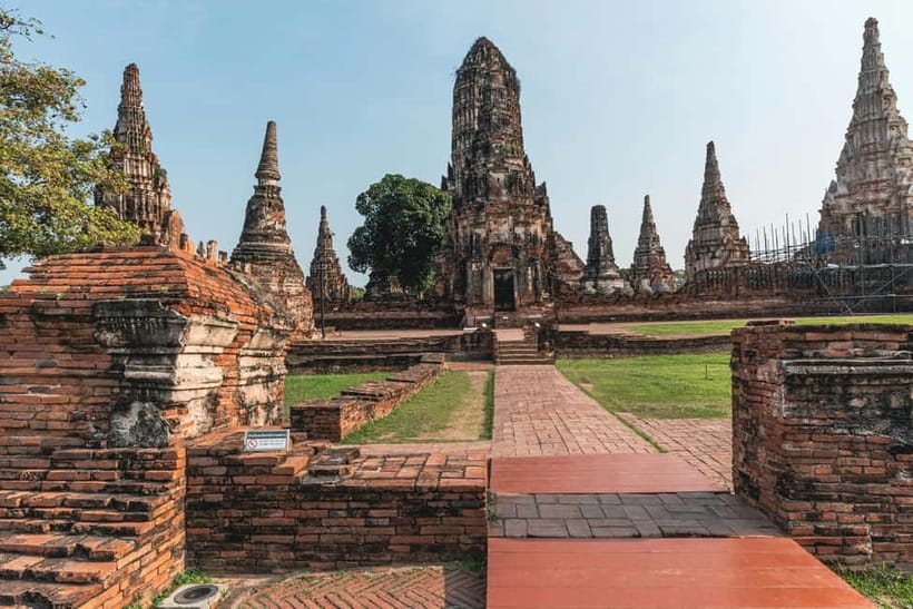 From Bangkok: Ayutthaya Heritage Tour with Sunset Boat Ride - Wat Maha That and the famous tree-root Buddha