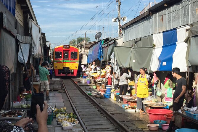 From Bangkok : Kanchanaburi Tour with Floating market Visit - The Death Railway Museum, Buddha Cave, and train ride
