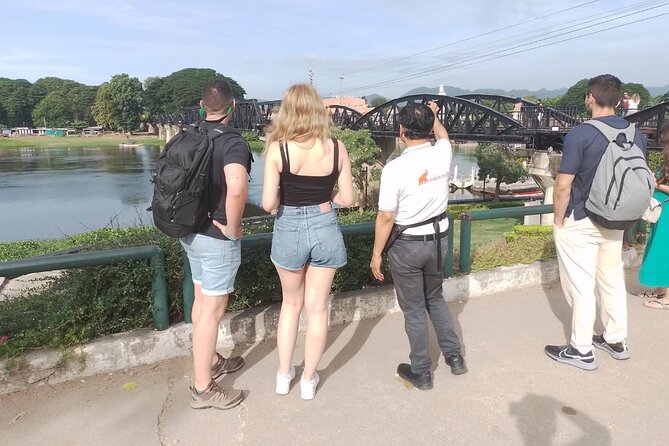 Full-Day Kanchanaburi River Kwai & Death Railway Private Tour - Approaching the River Khwae Bridge by boat