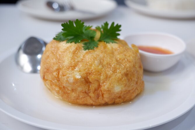 Half Day Bangkok Food and Sightseeing Tour - Sao Chingcha ends with a drink and a view