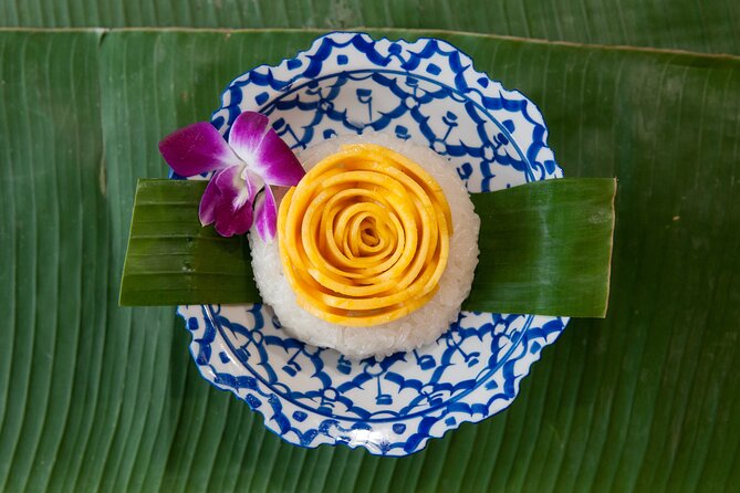 Hands-on Thai Cooking Class & Market Tour in Sukhumvit - Eating four dishes changes the value calculation