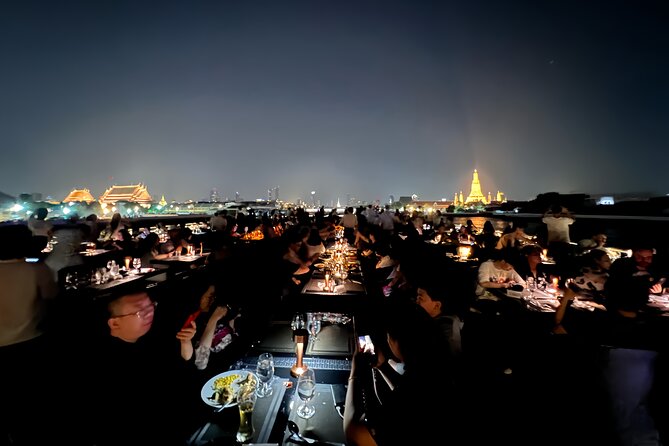 Luxury Dinner Cruise with Guide and Transfer (Opt. Executive Van) - A candlelit boat ride with Bangkok views