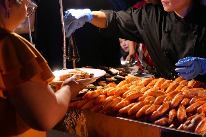 Luxury Dinner Cruise with Guide and Transfer (Opt. Executive Van) - Dinner, music, and the buffet question