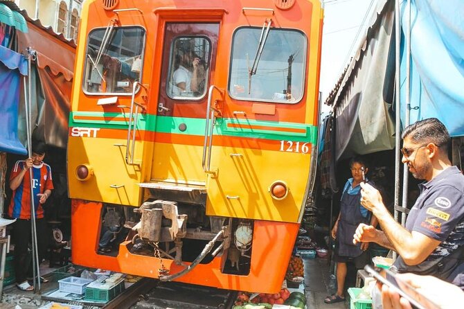 Maeklong Railway Market and Damnoen Saduak Floating Market Tour From Bangkok - A tourist market with real atmosphere and real sales pressure