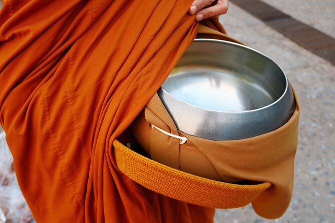 Morning Buddhist Almsgiving, Grand Palace and Flower Market Tour in Bangkok - Wat Benchamabophit and the meaning of the offering