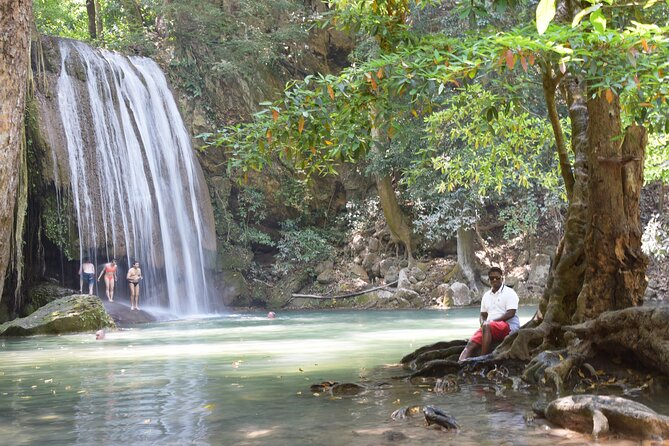 Private 2 Day Tour to Erawan Waterfall and Highlights of Kanchanaburi - Maeklong Market and the train through the stalls