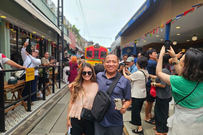 Private Floating Market, Train Market and After Rain Cafe Tour - A train line running through Maeklong Market