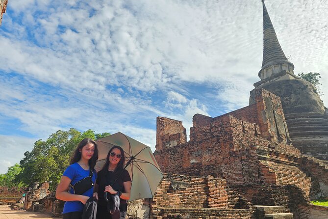 Private Tour to Ayutthaya, World Heritage Site with Boat Tour - Wat Mahathat and the Buddha head in the roots