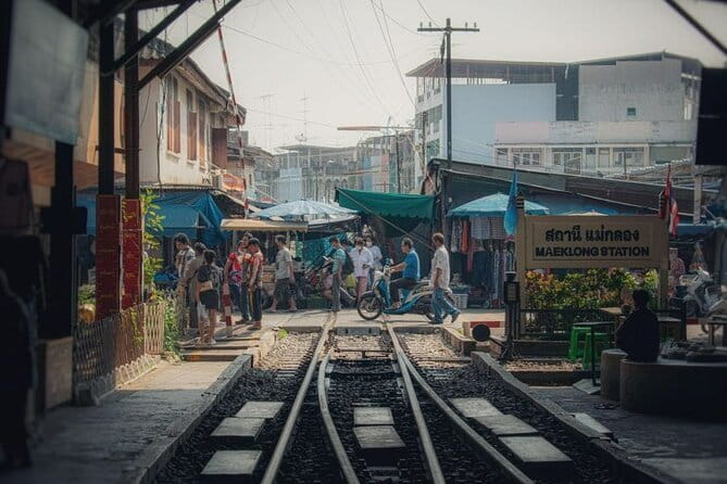 Private Tour to Maeklong Train Market and Floating Market - Walking through Damnoen Saduak Floating Market