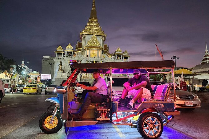 Private Tuk Tuk Night Adventure with Dinner - Seeing Wat Arun lit beside the river