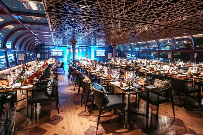 Saffron: A Luxurious Dinner Voyage on the River of Kings - The Grand Palace and Wat Arun after sunset