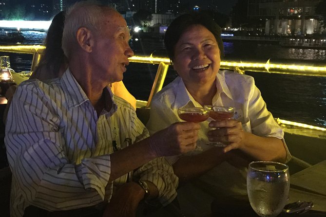Smile Dinner Cruise Experience: Dining & Live Entertainment - The two-level boat and the open-air upper deck