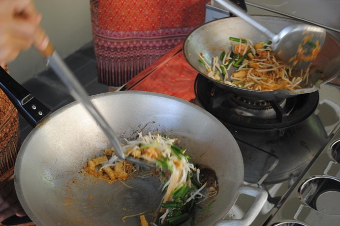 Thai Cooking Class - Picking herbs before the cooking begins