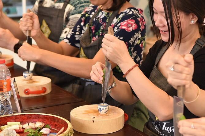 Thai Cooking Class with Market Tour in Sathon Bangkok - Two hours of cooking and four hot dishes