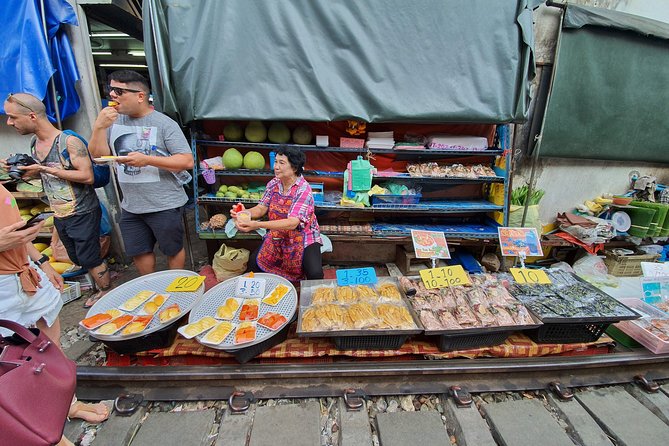 Train & Floating Market Food Adventure + Scenic train ride - Damnoen Saduak Floating Market by boat