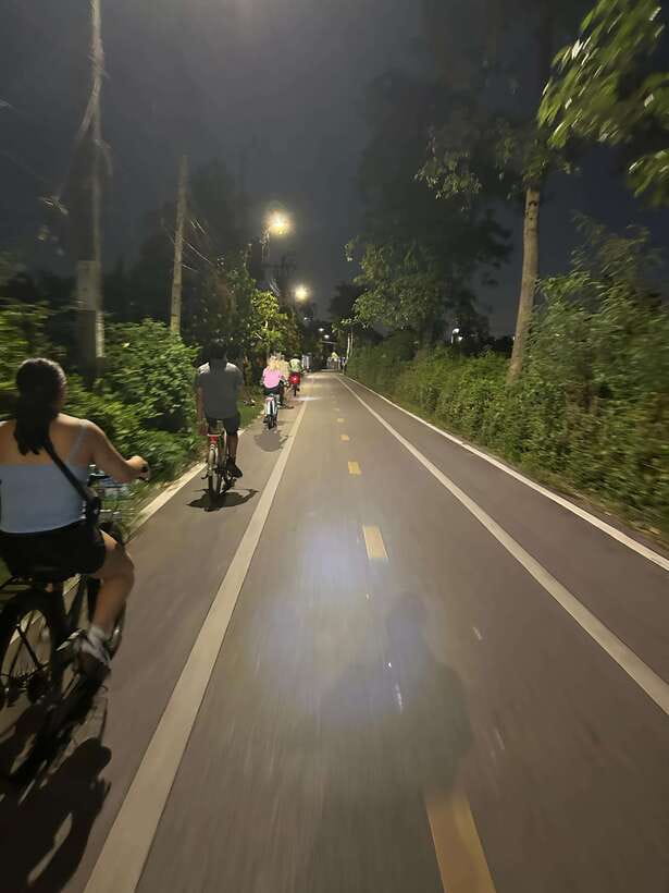 Twilight Firefly Bangkok Bicycle Tour - Sri Nakhon Khuean Khan Park at sunset